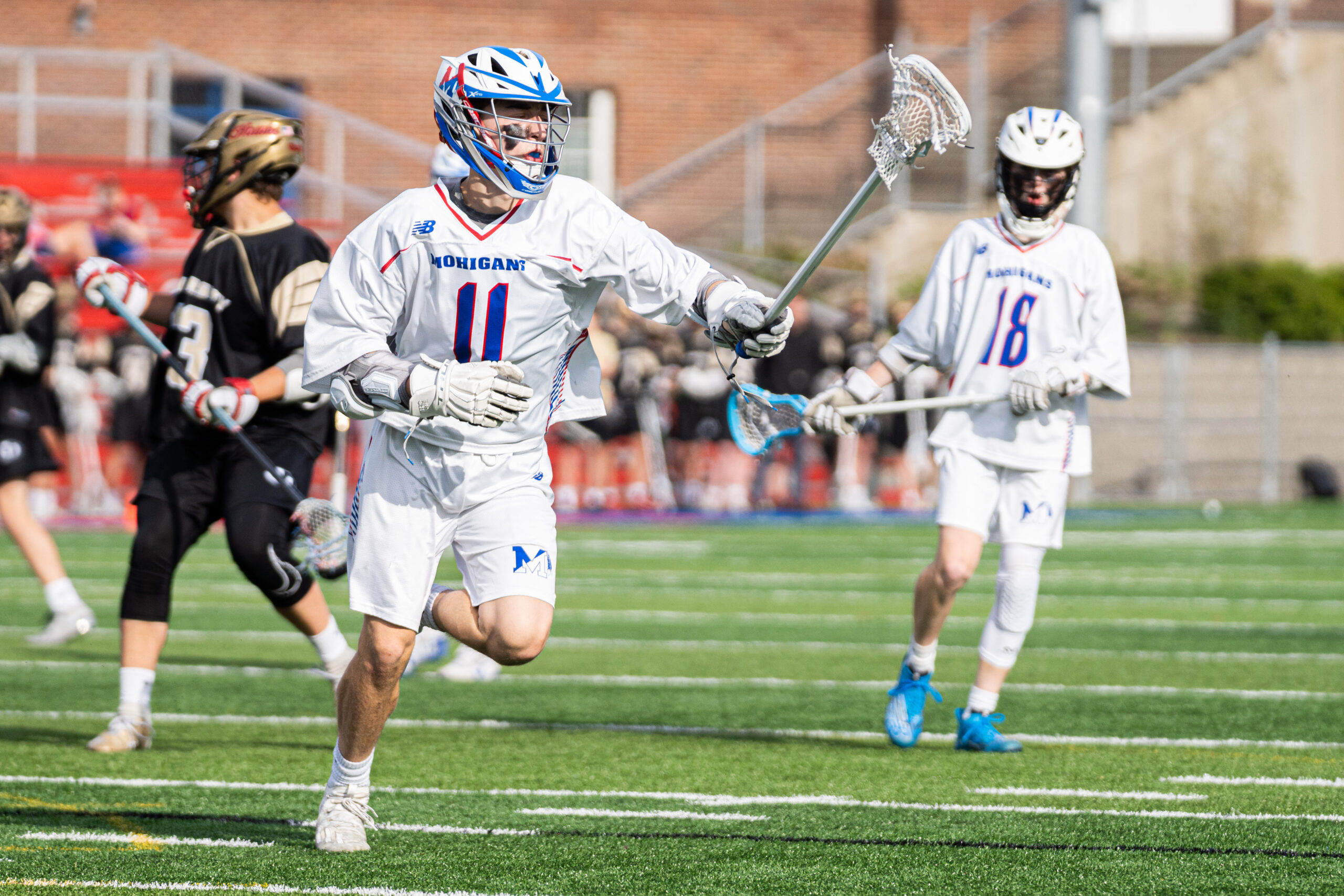 Morgantown boys lacrosse outpace University, secure top seed in East playoff bracket